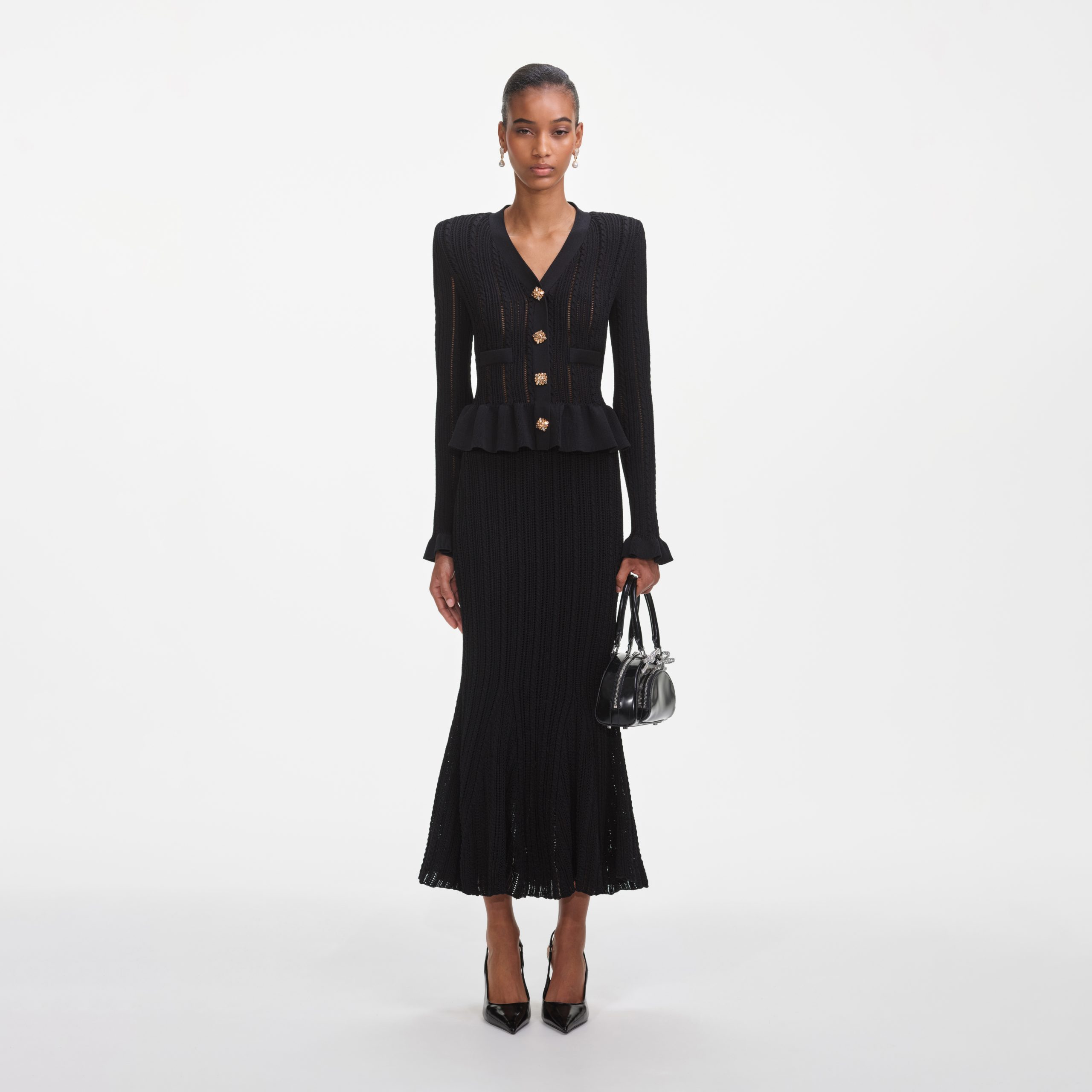 7811_black knit peplum midi dress_1758265957